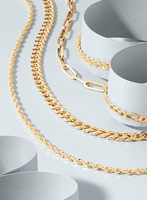 alt= Gold Chain Necklaces in rope, figaro and paperclip accents for Him and Her
